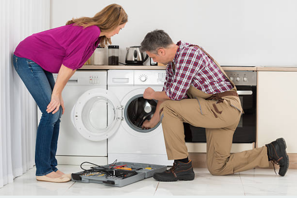 Picture of a dryer repairman.