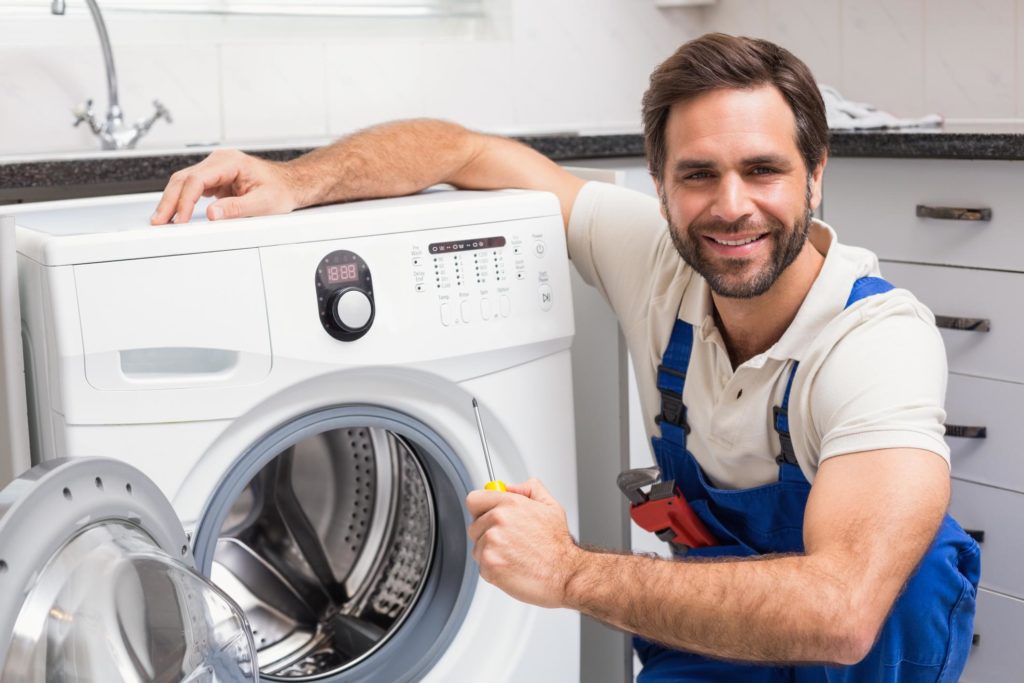 Picture of a washer repairman.